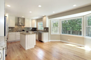 Kitchen with hardwood floors and a large picture window